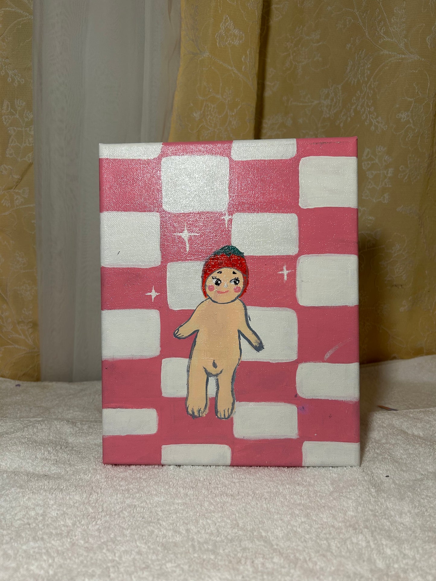 Pink checkered Sonny angel